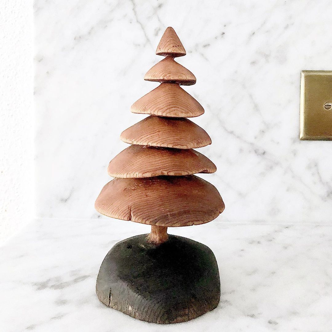 Carved a crooked little tree from an old cedar fence post 🌲 — @bradcerasani on Instagram